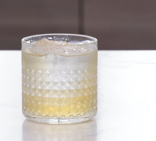 Clarified Milk Punch cocktail in a glass